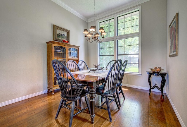 14309 Richard Walker Blvd, Austin, TX 78728 - dining area with a chandelier, plenty of natural light, dark wood-type flooring, and crown molding