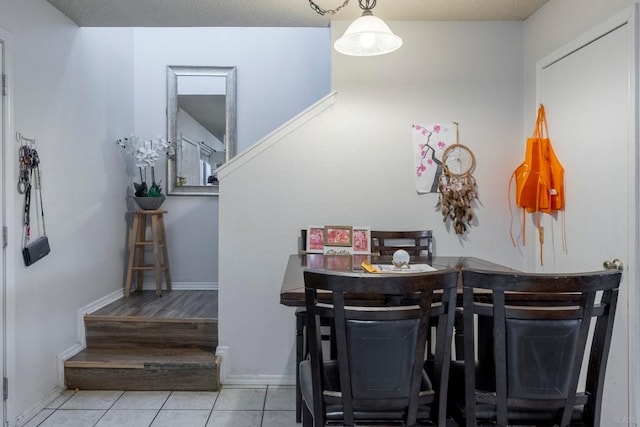 2903 W Slaughter Ln, Austin, TX 78748 - tiled dining area featuring baseboards