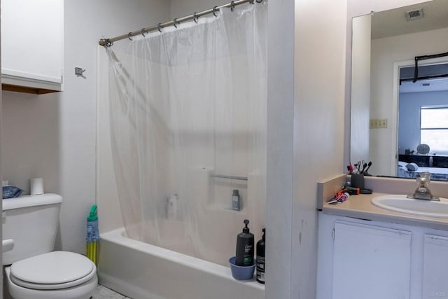 2903 W Slaughter Ln, Austin, TX 78748 - bathroom featuring toilet, vanity, and shower / bathtub combination with curtain