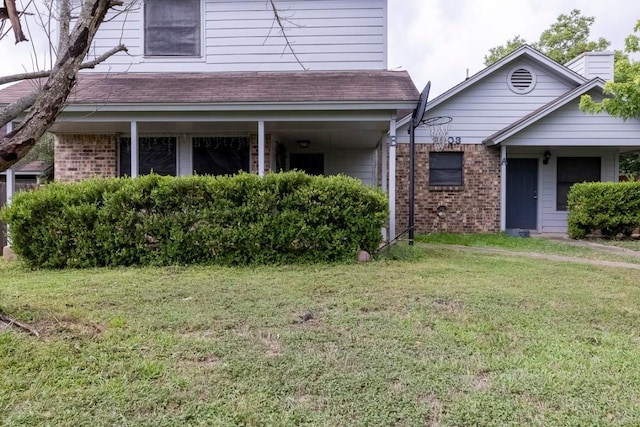 2903 W Slaughter Ln, Austin, TX 78748 - view of front of property with brick siding and a front lawn