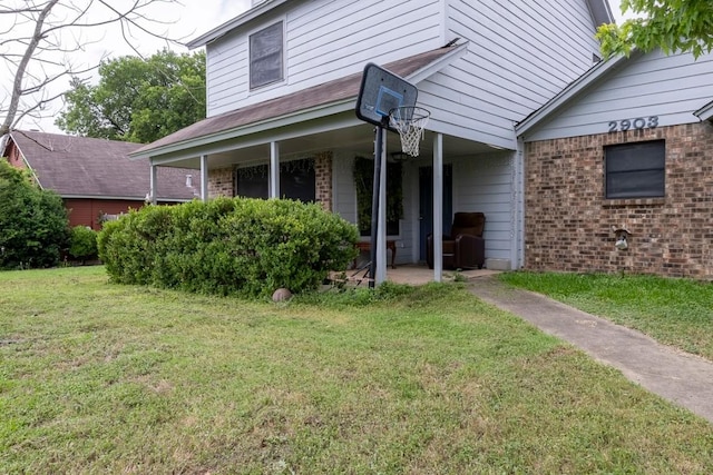2903 W Slaughter Ln, Austin, TX 78748 - view of front of home with brick siding and a front lawn