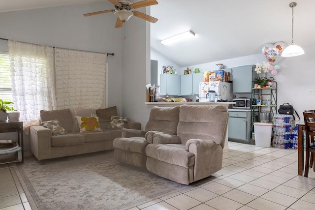 2903 W Slaughter Ln, Austin, TX 78748 - living room featuring light tile patterned flooring, a ceiling fan, and high vaulted ceiling