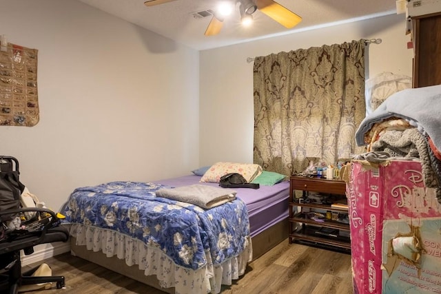 2903 W Slaughter Ln, Austin, TX 78748 - bedroom featuring wood finished floors and a ceiling fan