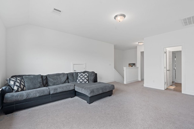 104 Meadow Wood Cv, Georgetown, TX 78626 - carpeted living area with baseboards and vaulted ceiling
