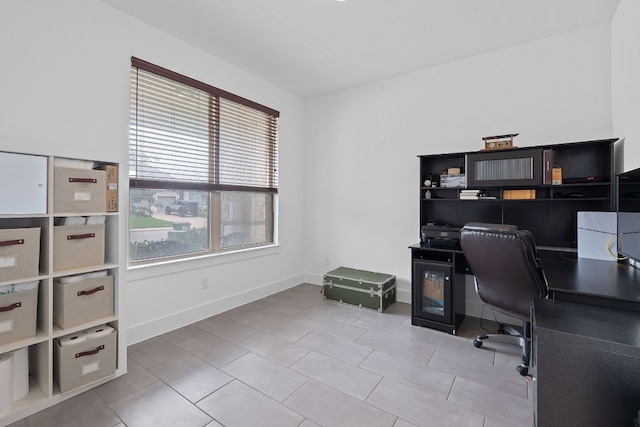104 Meadow Wood Cv, Georgetown, TX 78626 - office area featuring baseboards and tile patterned flooring