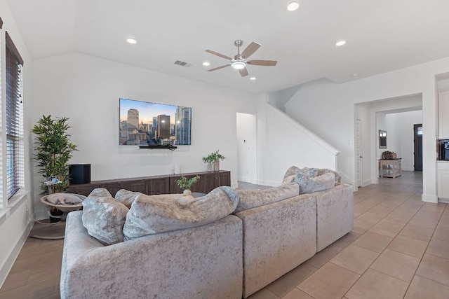 104 Meadow Wood Cv, Georgetown, TX 78626 - living area with ceiling fan, recessed lighting, baseboards, and vaulted ceiling