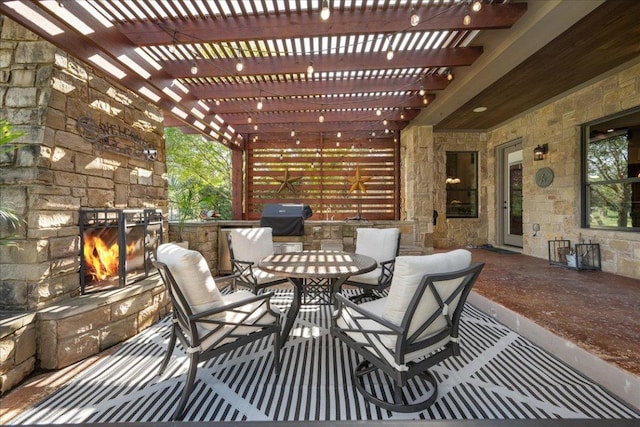 102 Standing Oak Dr, Georgetown, TX 78633 - view of patio with an outdoor stone fireplace, outdoor dining space, area for grilling, and a pergola