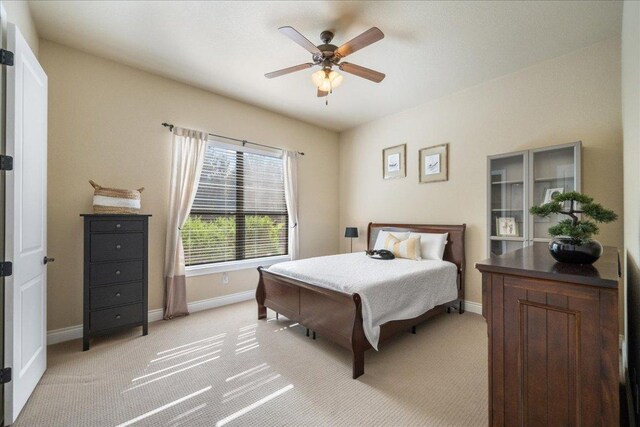 102 Standing Oak Dr, Georgetown, TX 78633 - bedroom featuring light colored carpet and a ceiling fan