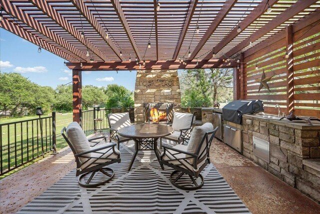102 Standing Oak Dr, Georgetown, TX 78633 - view of patio / terrace with an outdoor stone fireplace, a pergola, and area for grilling