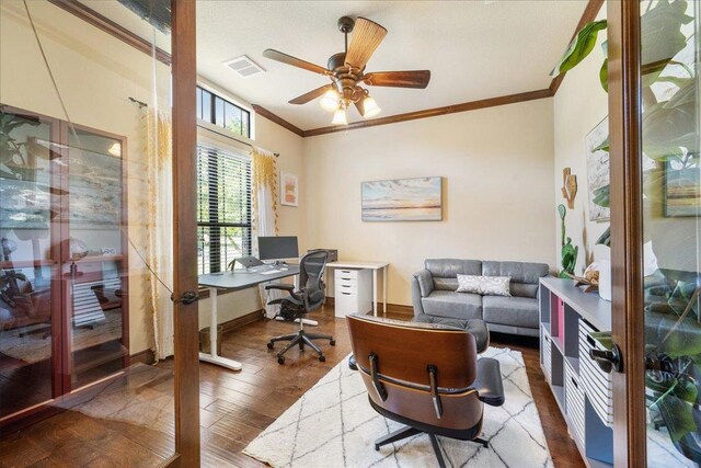 102 Standing Oak Dr, Georgetown, TX 78633 - home office with ornamental molding, wood finished floors, and ceiling fan