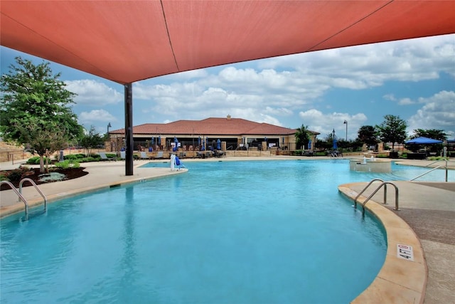 3241 Aurelia Ln, Round Rock, TX 78665 - community pool featuring a patio area