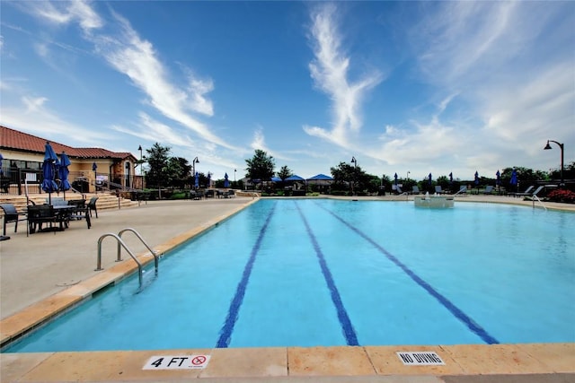 3241 Aurelia Ln, Round Rock, TX 78665 - community pool featuring a patio area