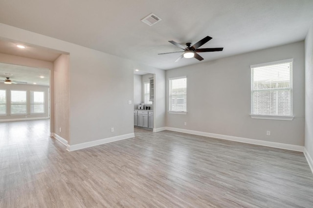 3241 Aurelia Ln, Round Rock, TX 78665 - unfurnished room with ceiling fan, plenty of natural light, light wood-type flooring, baseboards, and recessed lighting
