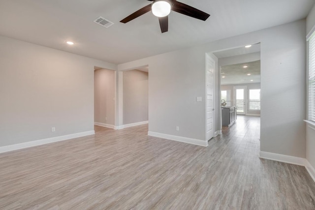 3241 Aurelia Ln, Round Rock, TX 78665 - empty room with a ceiling fan, light wood-style floors, recessed lighting, and baseboards