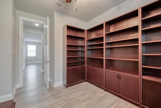 3241 Aurelia Ln, Round Rock, TX 78665 - spacious closet with light wood-type flooring and ceiling fan
