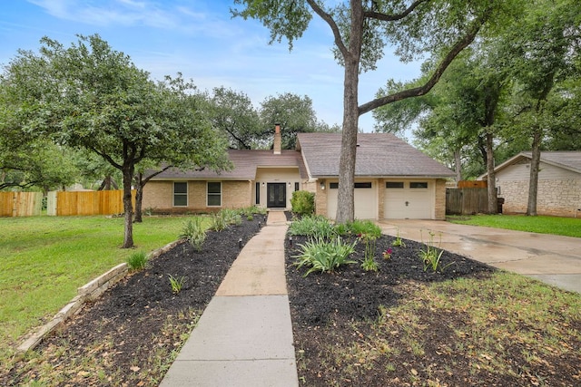 13007 Stillforest St, Austin, TX 78729 - view of front of house with concrete driveway, brick siding, a garage, and a chimney
