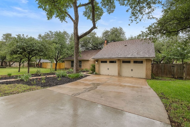 13007 Stillforest St, Austin, TX 78729 - view of front of house with brick siding, concrete driveway, an attached garage, and roof with shingles
