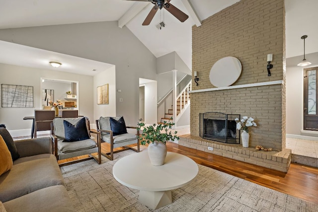 13007 Stillforest St, Austin, TX 78729 - living area featuring high vaulted ceiling, wood finished floors, a ceiling fan, beamed ceiling, and baseboards
