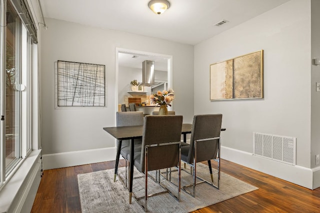13007 Stillforest St, Austin, TX 78729 - dining space with wood finished floors and baseboards