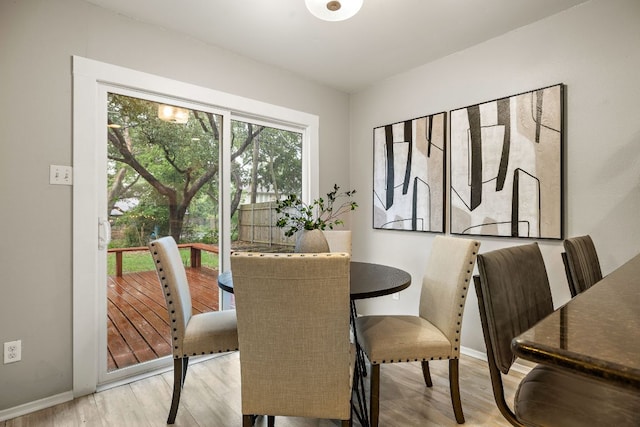 13007 Stillforest St, Austin, TX 78729 - dining area with light wood finished floors and baseboards