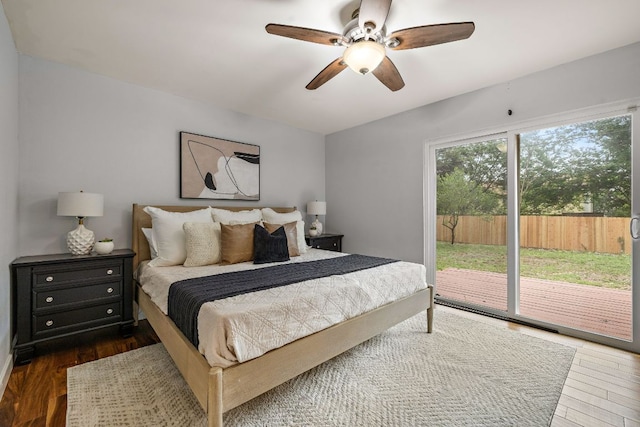 13007 Stillforest St, Austin, TX 78729 - bedroom with access to outside, wood finished floors, and a ceiling fan