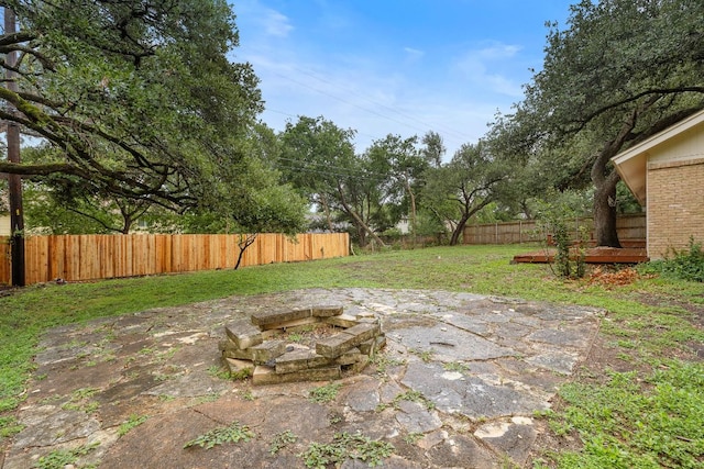 13007 Stillforest St, Austin, TX 78729 - view of yard with a fire pit and a patio