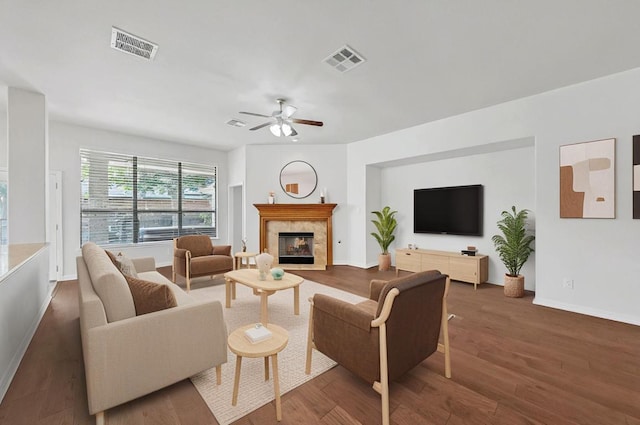20700 Windmill Ridge St, Pflugerville, TX 78660 - living area featuring ceiling fan, wood finished floors, and a fireplace