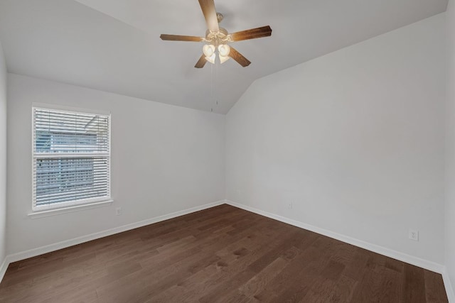 20700 Windmill Ridge St, Pflugerville, TX 78660 - unfurnished room with vaulted ceiling, dark wood-style floors, and a ceiling fan
