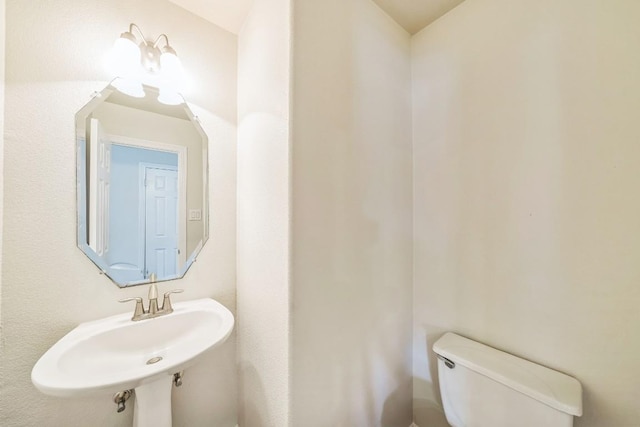 20700 Windmill Ridge St, Pflugerville, TX 78660 - bathroom with toilet and a sink