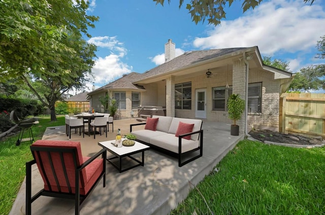 20700 Windmill Ridge St, Pflugerville, TX 78660 - rear view of house with outdoor lounge area, brick siding, a chimney, a patio area, and a fenced backyard