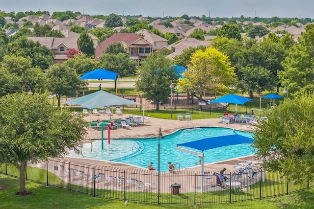 20700 Windmill Ridge St, Pflugerville, TX 78660 - community pool featuring a residential view