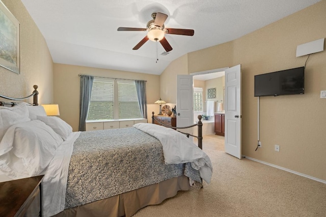 11208 Persimmon Gap Dr, Austin, TX 78717 - bedroom with multiple windows, light colored carpet, vaulted ceiling, a ceiling fan, and baseboards