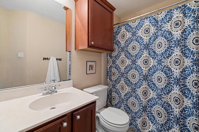 11208 Persimmon Gap Dr, Austin, TX 78717 - full bathroom featuring vanity, toilet, a shower with shower curtain, a textured ceiling, and a textured wall