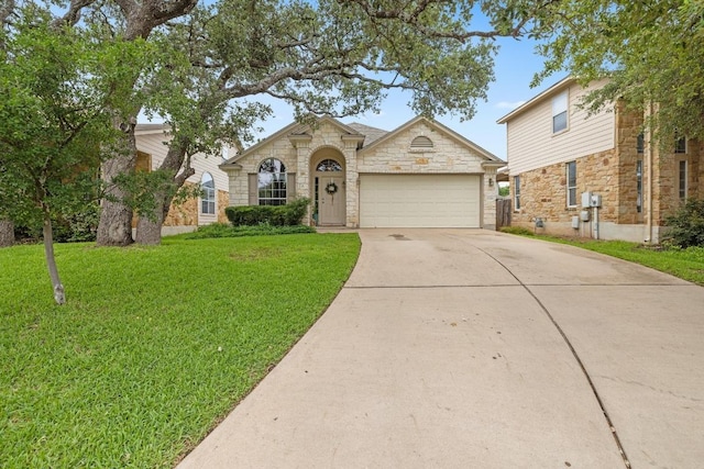 11208 Persimmon Gap Dr, Austin, TX 78717 - traditional-style house with driveway, a garage, a front lawn, and stone siding