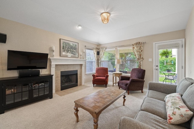11208 Persimmon Gap Dr, Austin, TX 78717 - living area with carpet floors, a tile fireplace, and baseboards