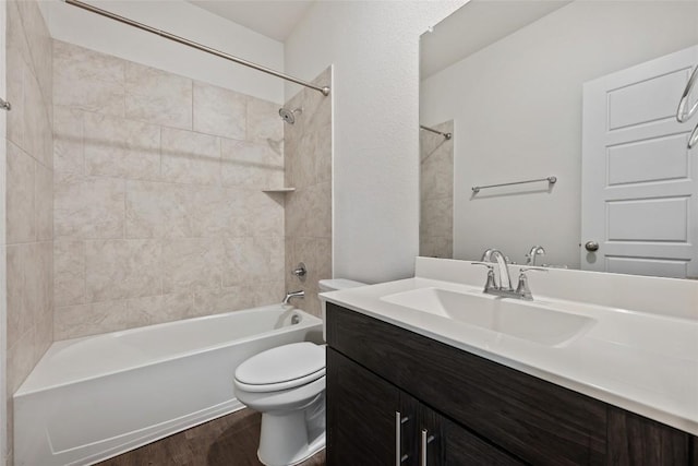 605 Bridle Creek Dr, Georgetown, TX 78626 - bathroom with wood finished floors, toilet, vanity, and shower / bathtub combination