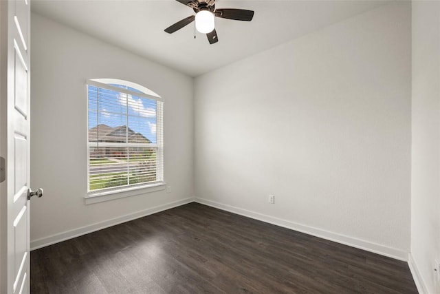 605 Bridle Creek Dr, Georgetown, TX 78626 - spare room with dark wood-type flooring, baseboards, and ceiling fan