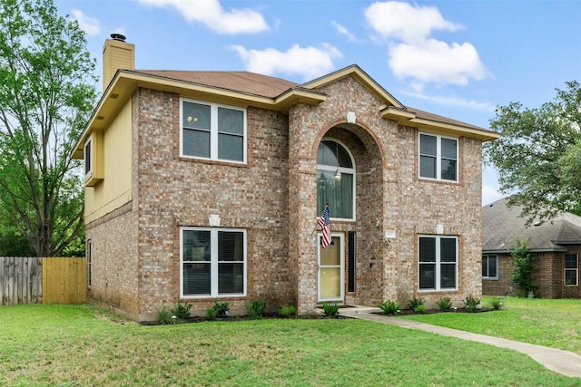 17121 Bishopsgate Dr, Pflugerville, TX 78660 - traditional-style house with a chimney and brick siding