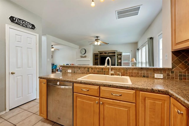 17121 Bishopsgate Dr, Pflugerville, TX 78660 - kitchen with a sink, dishwasher, a ceiling fan, decorative backsplash, and open floor plan