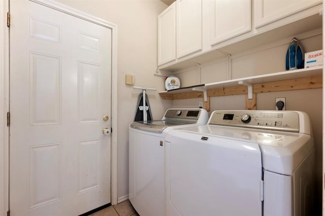 17121 Bishopsgate Dr, Pflugerville, TX 78660 - laundry room featuring washer and dryer, cabinet space, and light tile patterned flooring