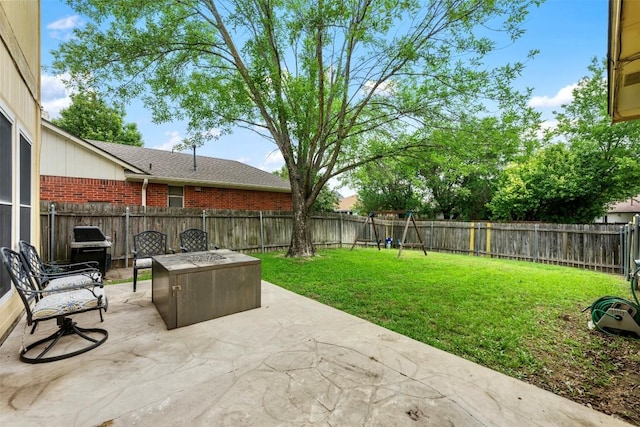 17121 Bishopsgate Dr, Pflugerville, TX 78660 - view of patio with grilling area and a playground