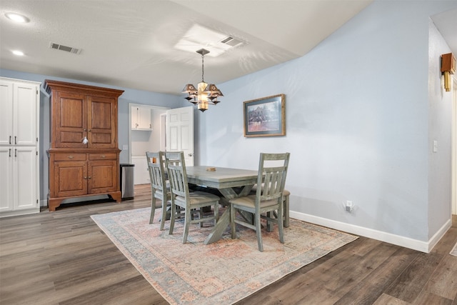 1250 S Rainbow Ranch Rd, Wimberley, TX 78676 - dining space with a chandelier, baseboards, wood finished floors, and recessed lighting