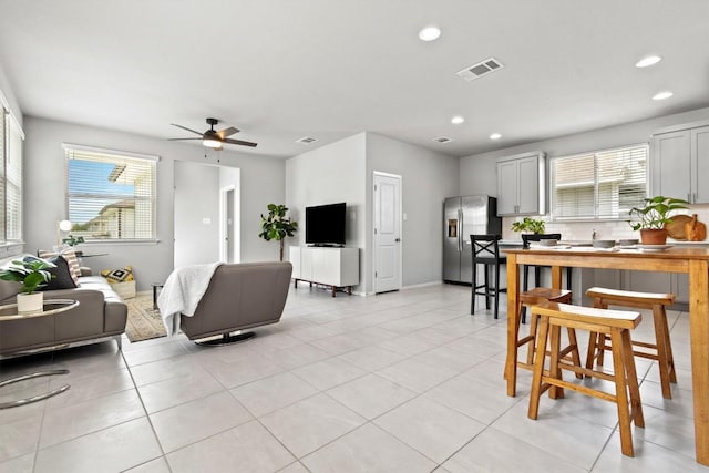 299 Fabion St, Kyle, TX 78640 - living area with recessed lighting, plenty of natural light, ceiling fan, and light tile patterned floors