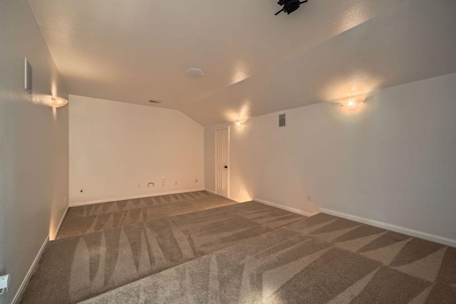 9812 Whitley Bay Dr, Austin, TX 78717 - spare room with carpet, lofted ceiling, and baseboards