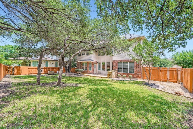 9812 Whitley Bay Dr, Austin, TX 78717 - back of property featuring a patio and brick siding