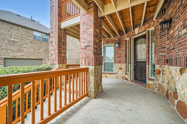 9812 Whitley Bay Dr, Austin, TX 78717 - view of exterior entry with brick siding, stone siding, and a porch