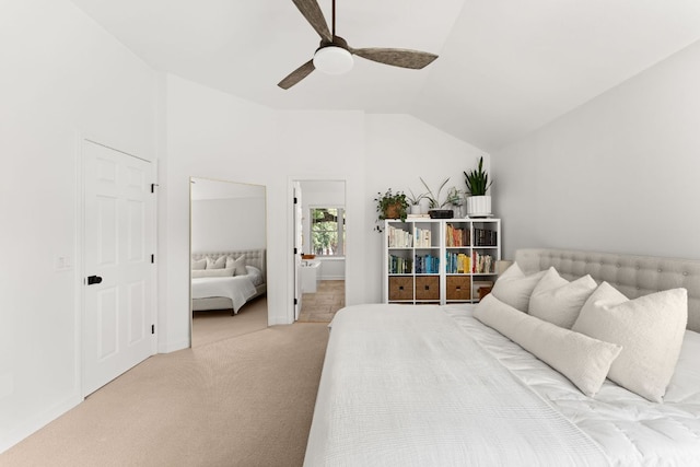 11542 Gun Fight Ln, Austin, TX 78748 - bedroom with vaulted ceiling, carpet, a ceiling fan, ensuite bath, and baseboards
