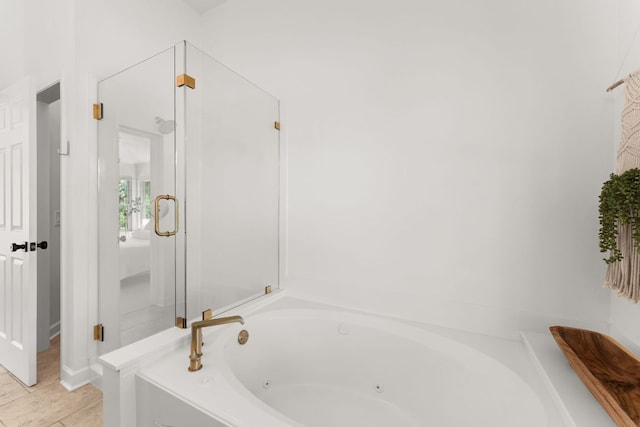 11542 Gun Fight Ln, Austin, TX 78748 - bathroom with a whirlpool tub and a shower stall