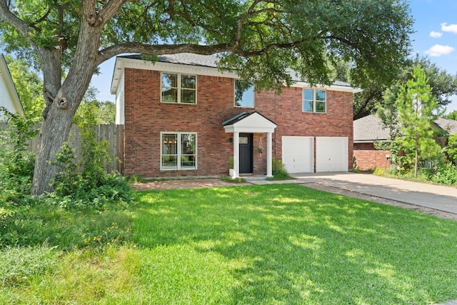 11542 Gun Fight Ln, Austin, TX 78748 - traditional-style house featuring concrete driveway, an attached garage, and brick siding