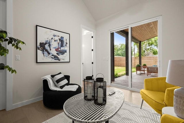 517 Tillery St Unit 3, Austin, TX 78702 - living area featuring vaulted ceiling and baseboards